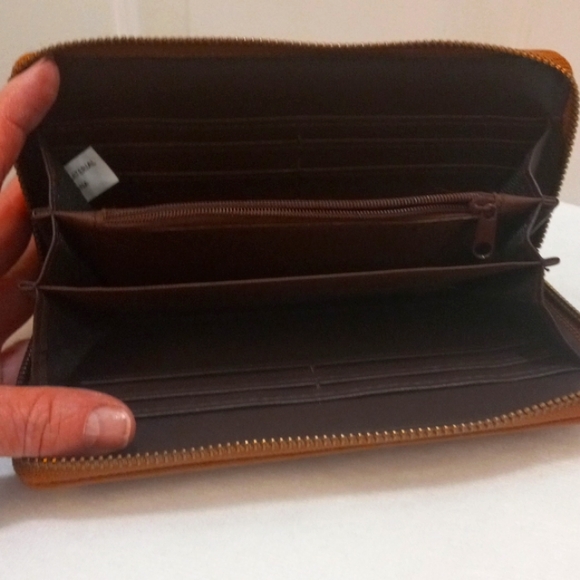 Tan Wallet with Elliptical Cutout W/Shimmering design behind - Picture 4 of 6